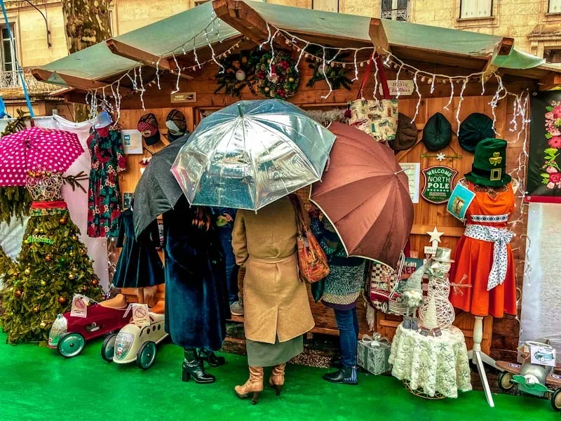 Three ladies at Sarlats Christmas Market